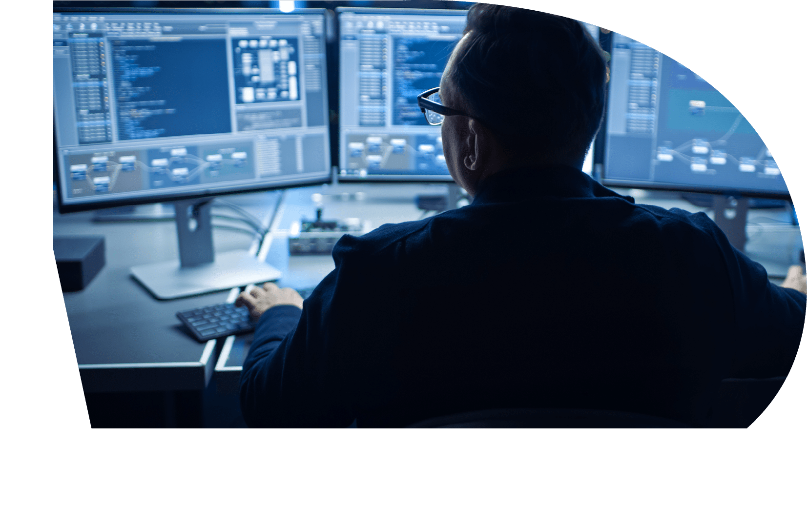Professional IT Programer Working in Data Center on Desktop Computer with Three Displays, Doing Development of Software and Hardware. Displays Show Blockchain, Data Network Architecture Concept