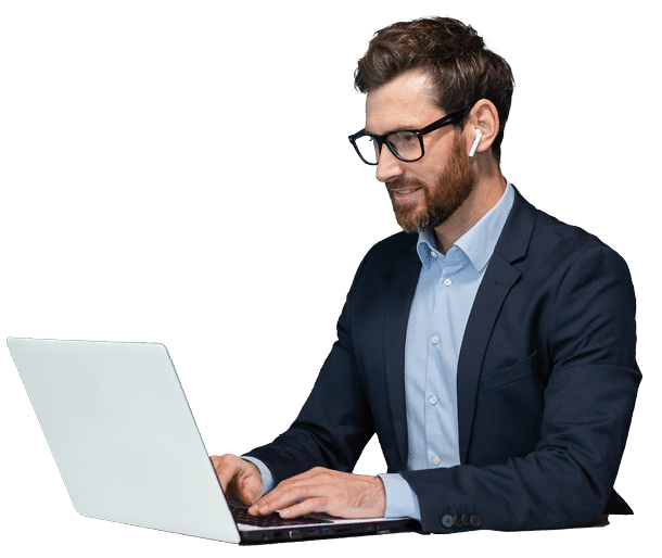 Successful mature businessman at work with laptop inside office, man in business suit sitting at desk typing on computer, satisfied with achievement result and work.